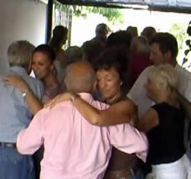 Milongueros dancing in a small space.