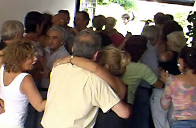 Milongueros dancing in a small space.